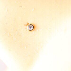 9kt Gold Nose Stud piercing with 2mm clear bezel gem New